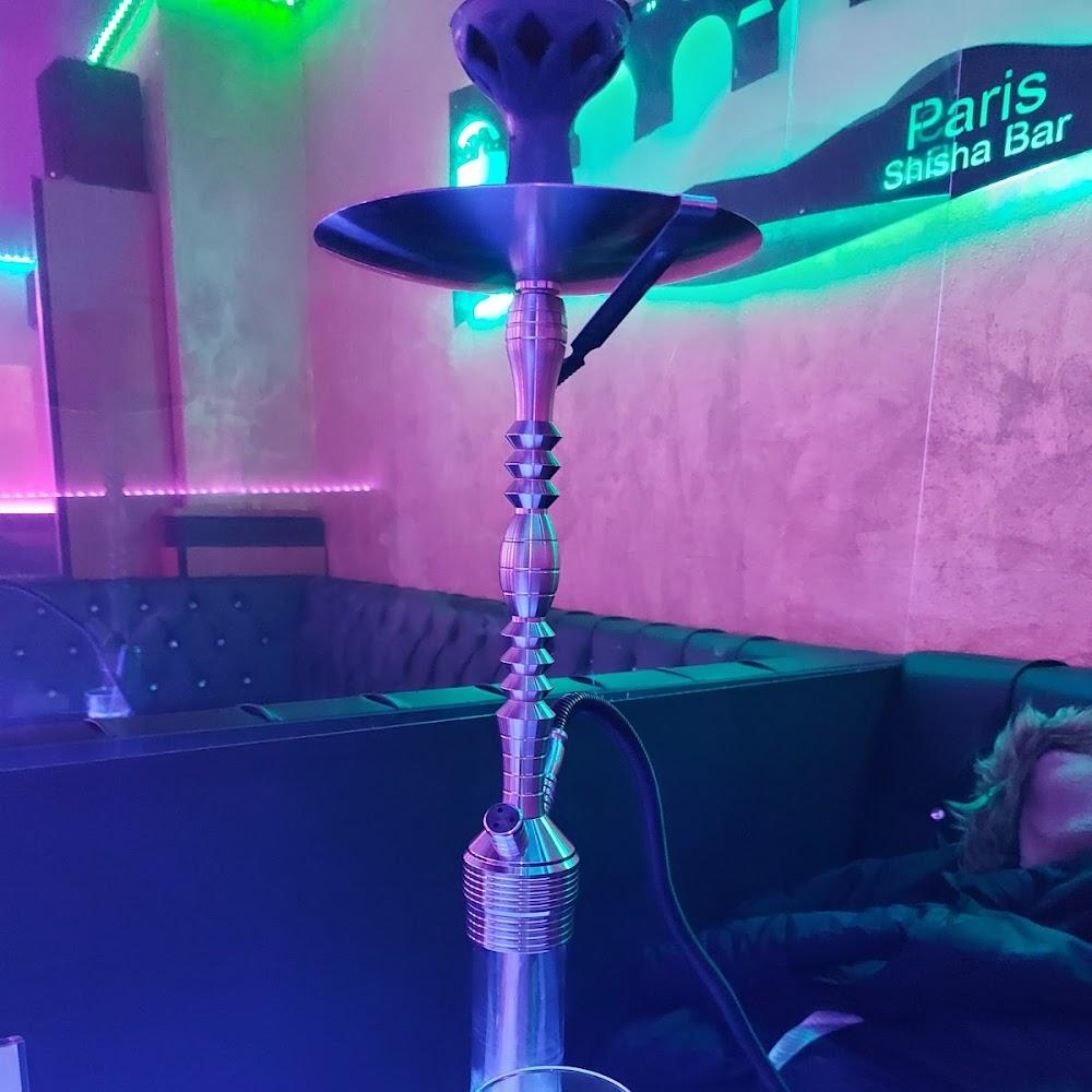 A silver hookah in a Paris shisha bar.